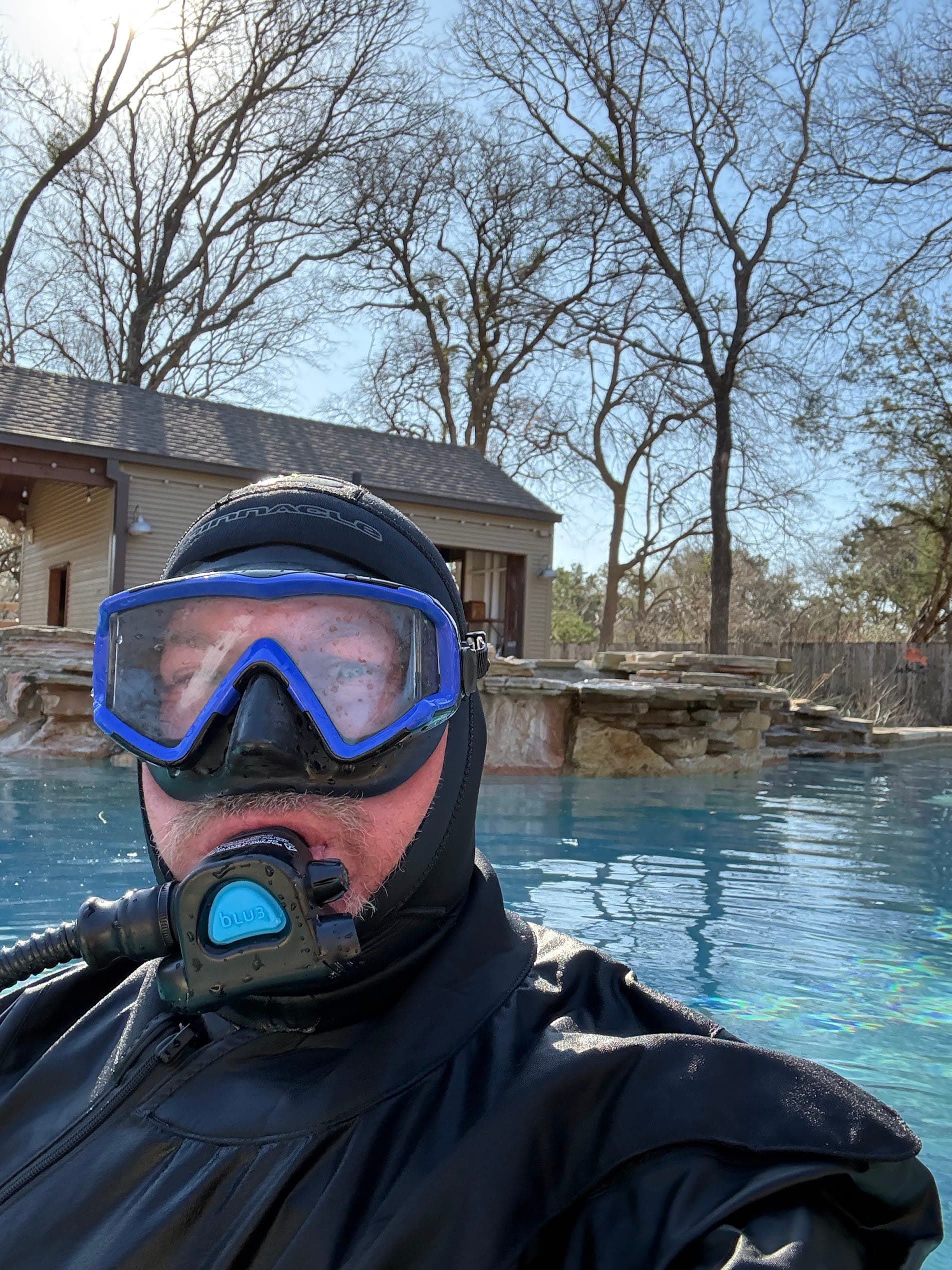 Certified pool inspection with professional scuba equipment for underwater evaluation